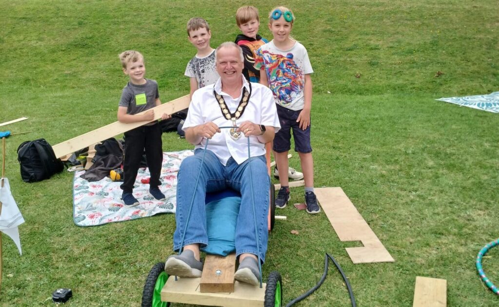 Mayor Andy Jones tries one of the go-kart creations